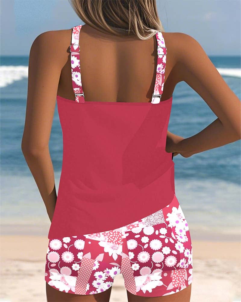 Back view of pink racerback tank top and floral swim shorts