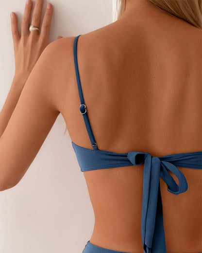 Back view of denim blue bandeau top with tie back