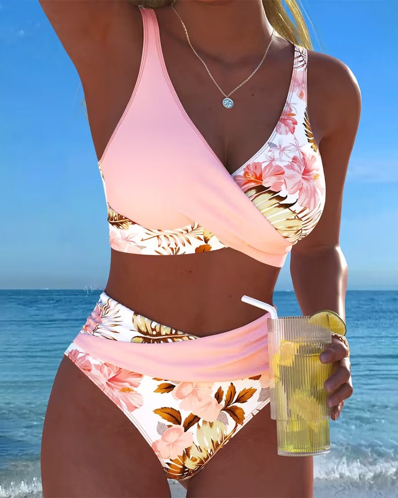 Pink floral wrap bikini with contrast panels and high waist bottom