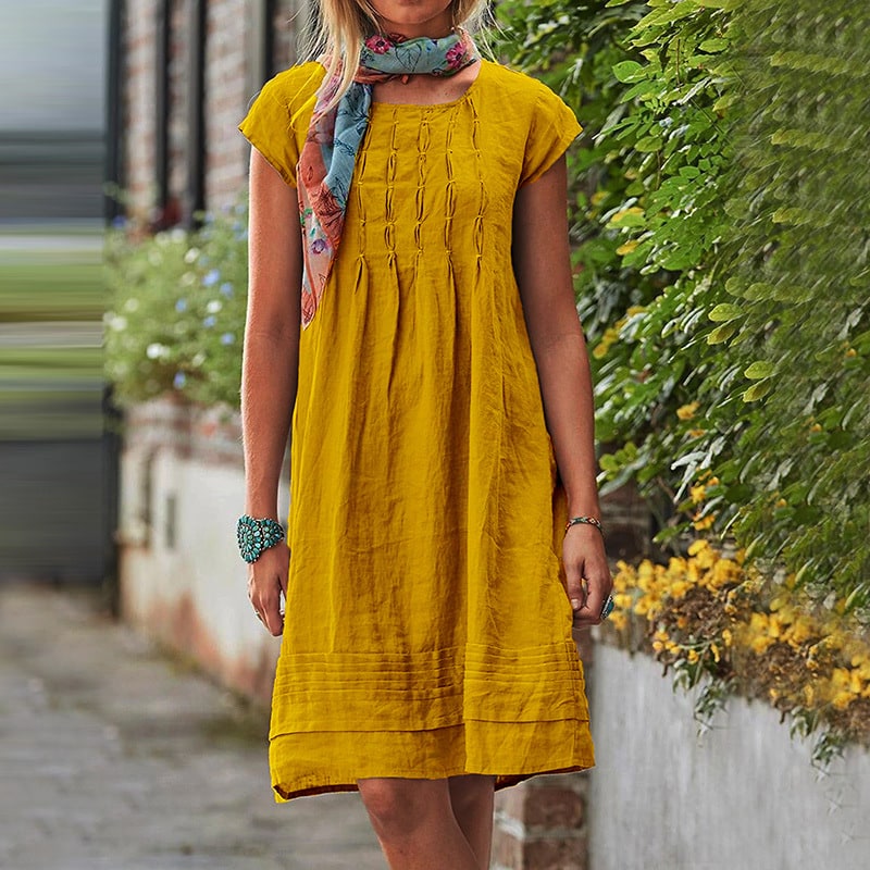 Mustard loose summer dress with pintuck bodice and short sleeves