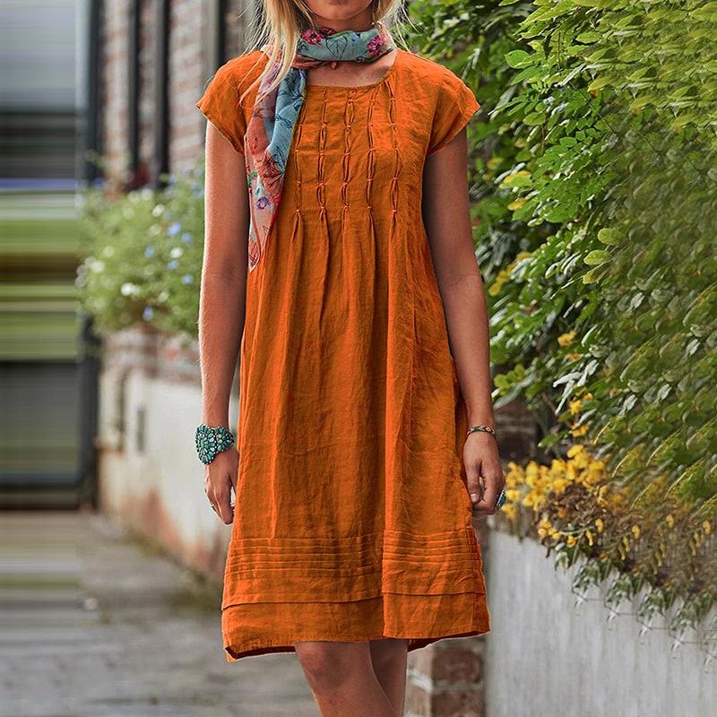 Burnt orange loose summer dress with pintuck bodice and short sleeves
