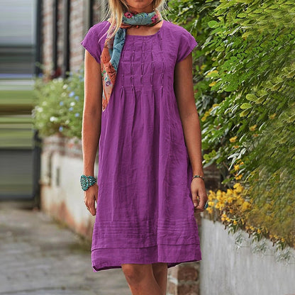 Purple loose summer dress with pintuck bodice and short sleeves