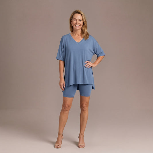 Women's denim blue oversized V neck top and biker shorts lounge set