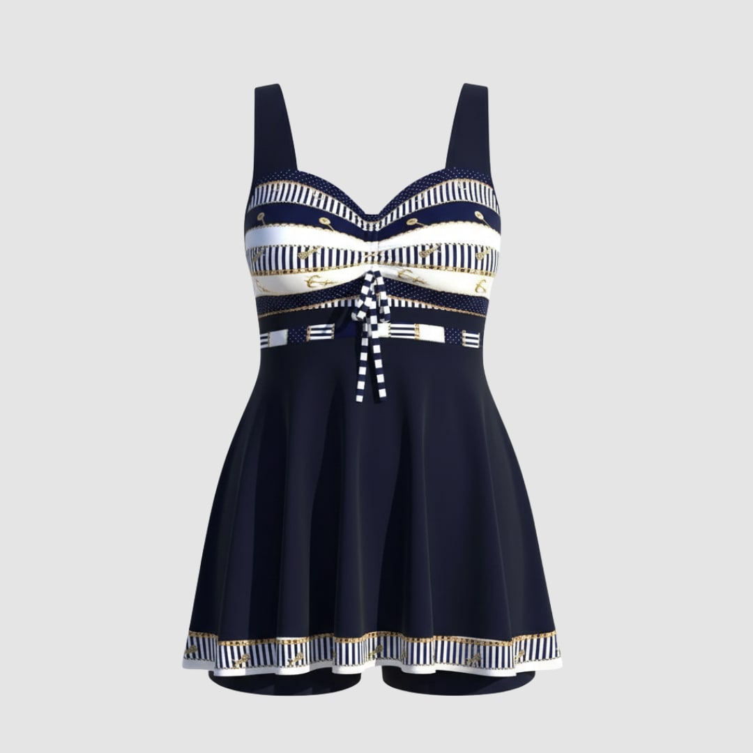 Navy blue swim dress with striped sweetheart bodice laid flat