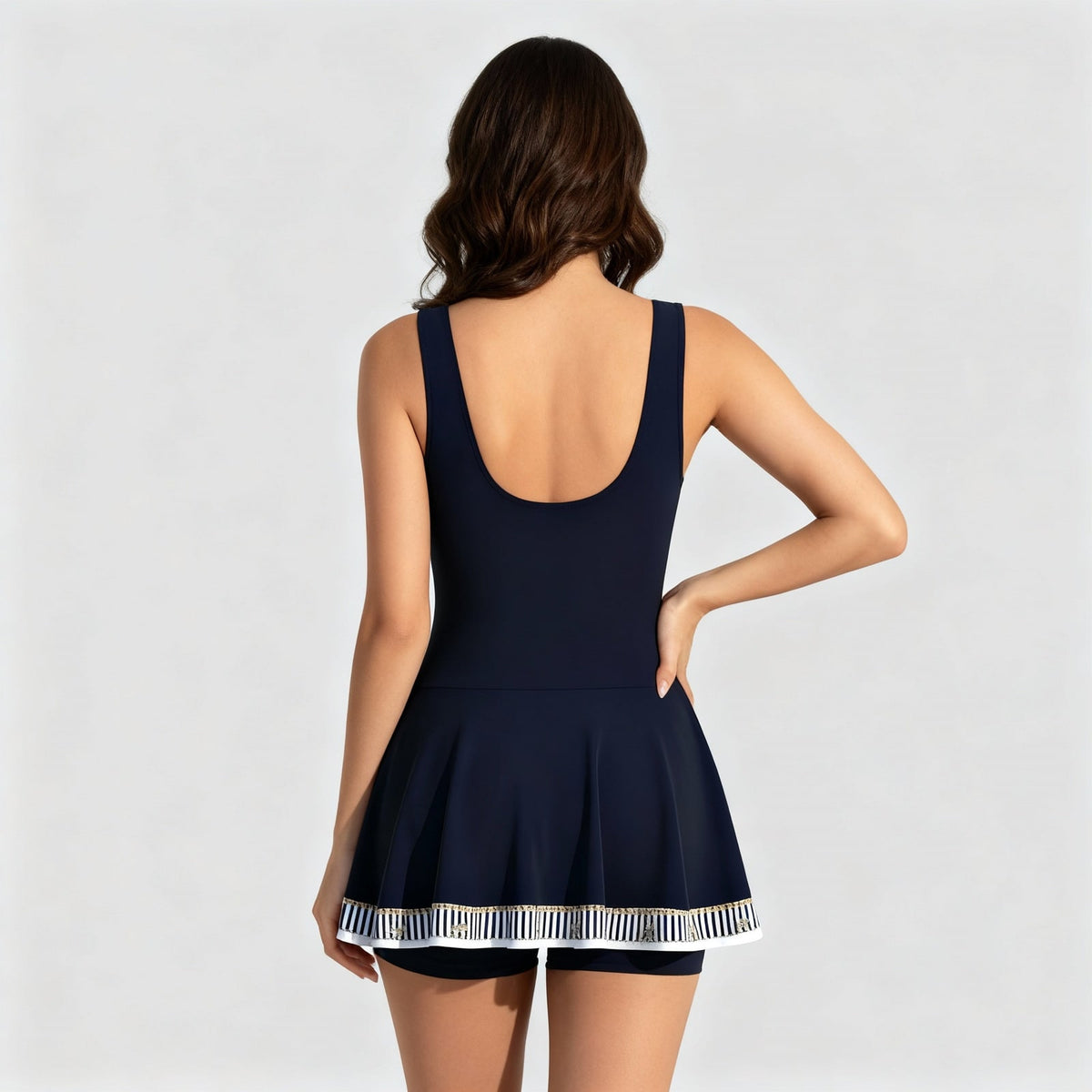 Back view of navy blue swim dress with wide straps