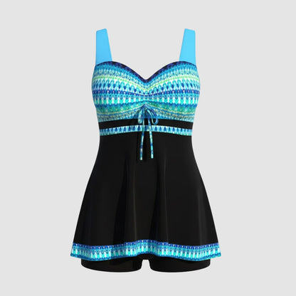 Light blue patterned swim dress with black skirt