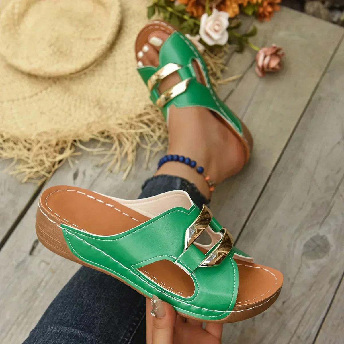 Green orthopedic wedge slide sandal with gold chain detail