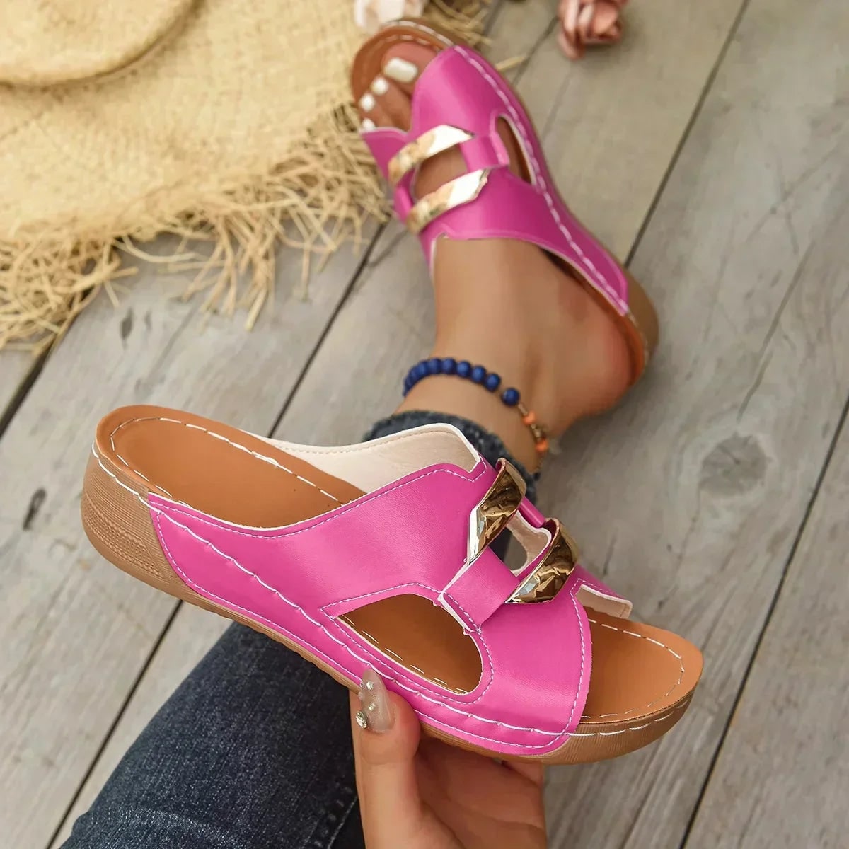 Pink orthopedic wedge slide sandal with gold chain detail