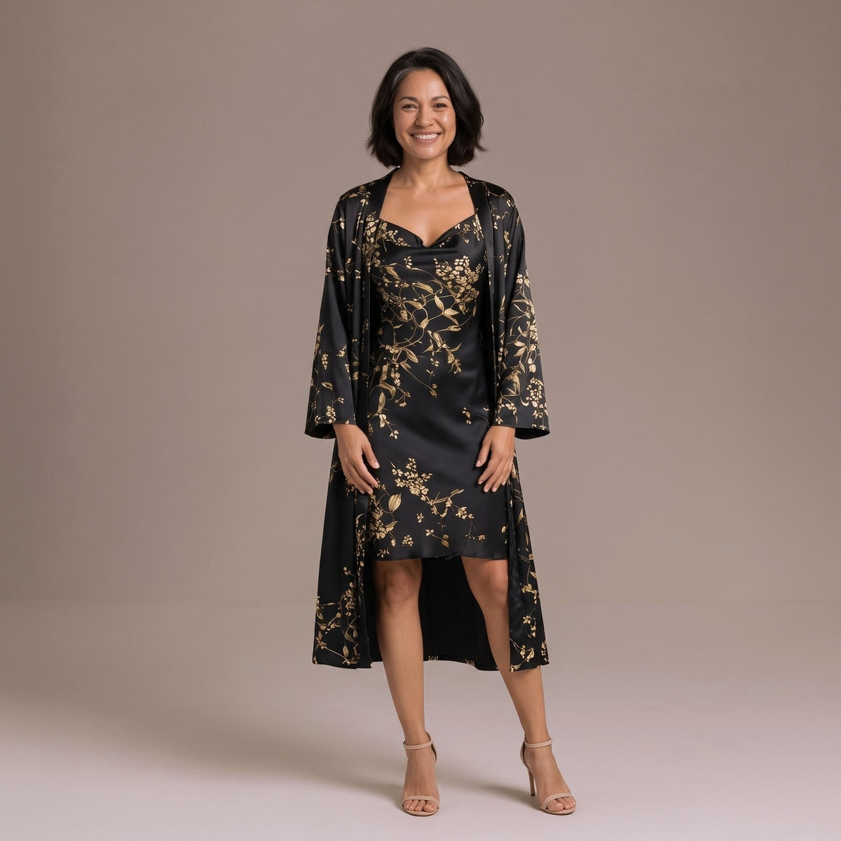 Black satin two piece set with slip dress and gold floral print long cape