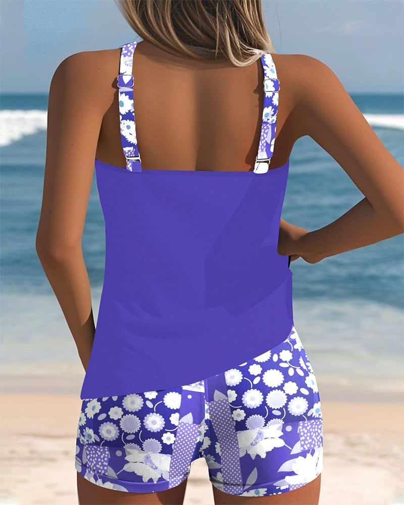 Back view of purple racerback tank top and floral swim shorts