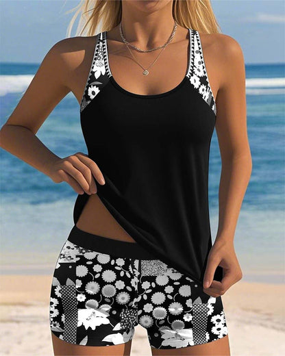 Black tankini swimsuit set with white floral swim shorts