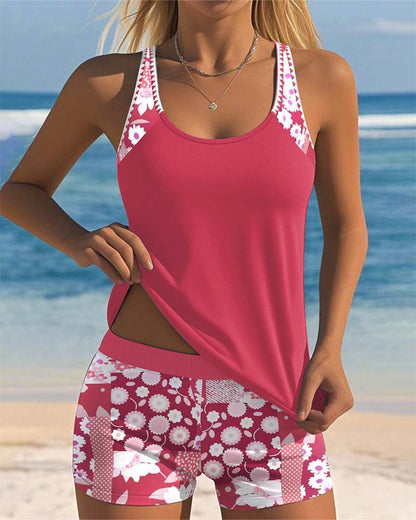 Pink tankini swimsuit set with floral swim shorts