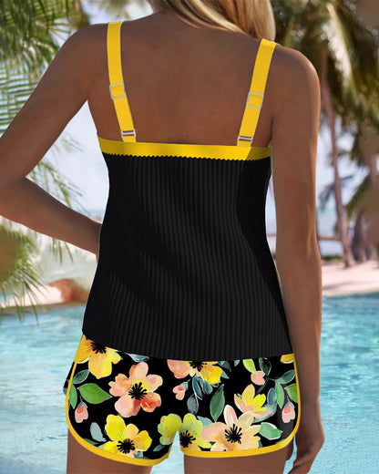 Back view of tankini top with yellow straps and floral swim shorts