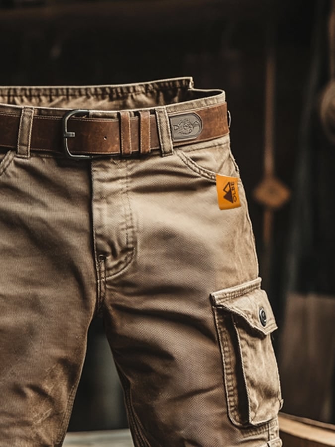 Close up of brown vintage cargo shorts pocket and patch label