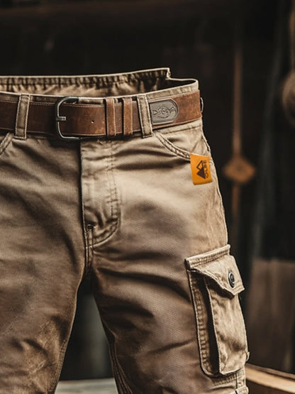 Close up of brown vintage cargo shorts pocket and patch label