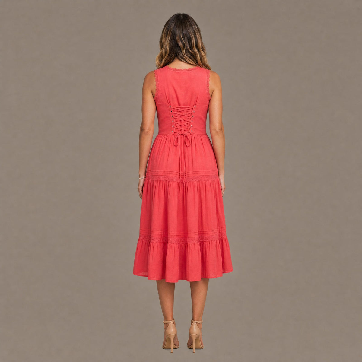 Back view of the red embroidered corset effect midi dress