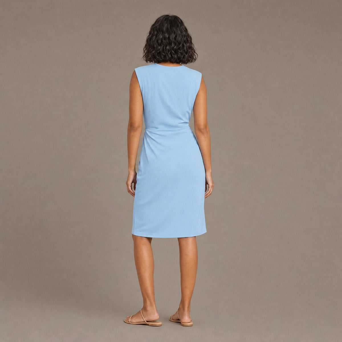 Back view of the azure blue lightweight midi slip dress