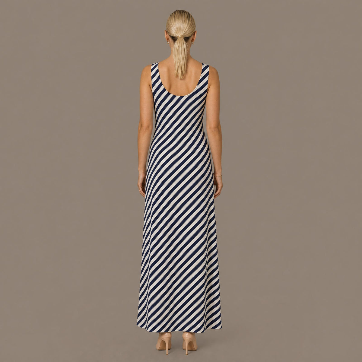 Back view of the navy stripe sleeveless midi dress