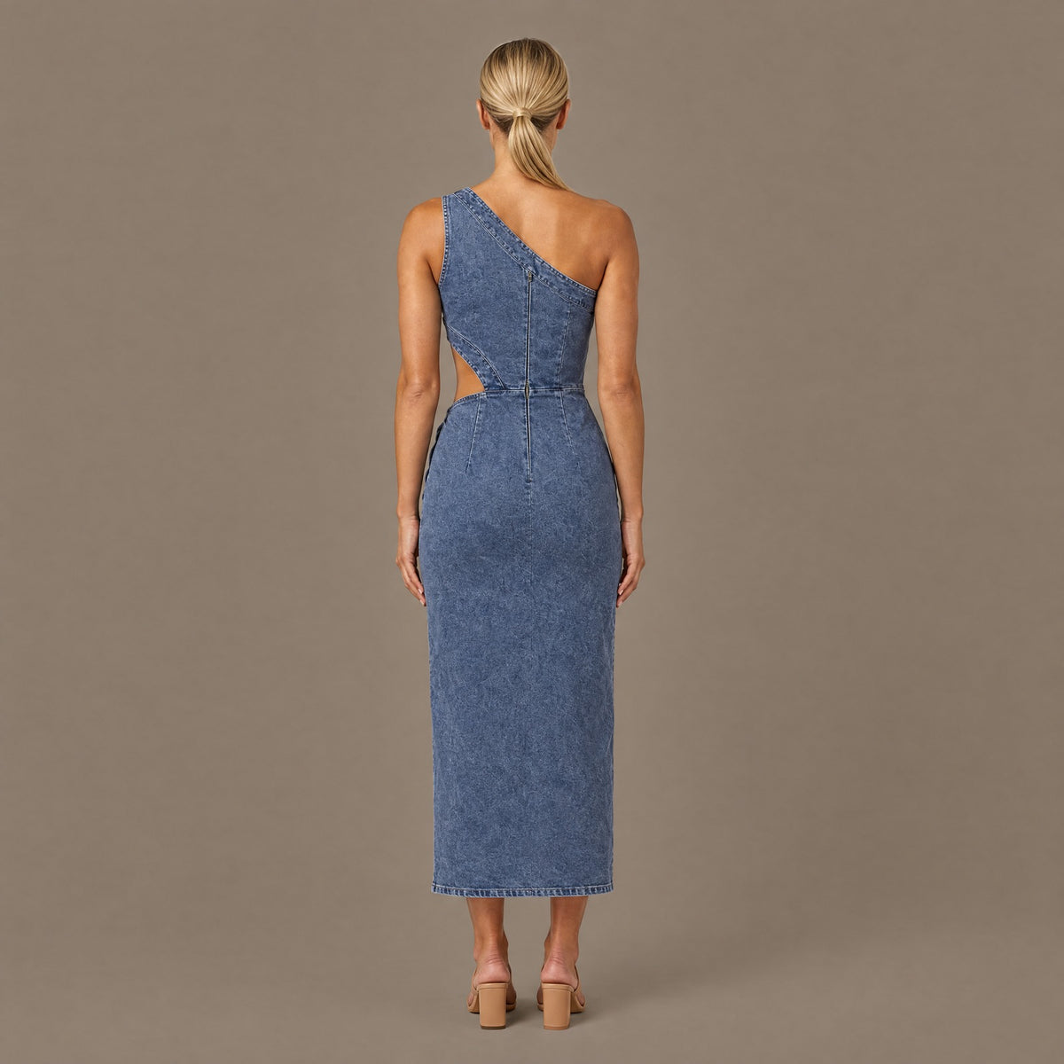 Back view of the steel blue one shoulder denim midi dress showing the zipper