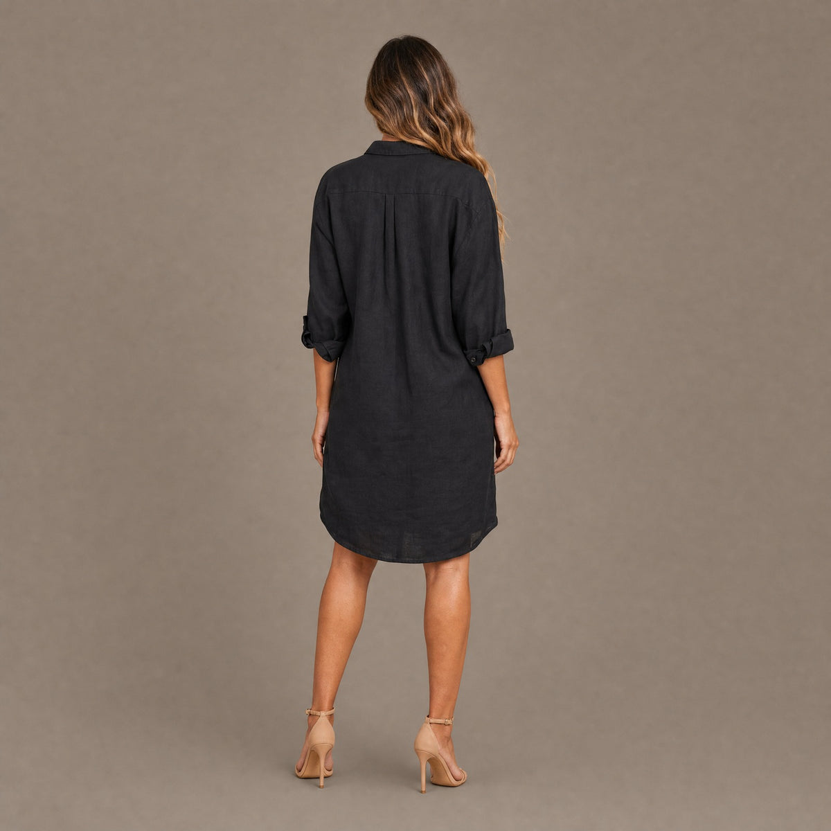 Back view of the black oversized linen blend button down shirt dress