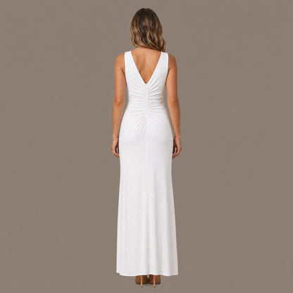 Back view of the white ruched V neck maxi dress