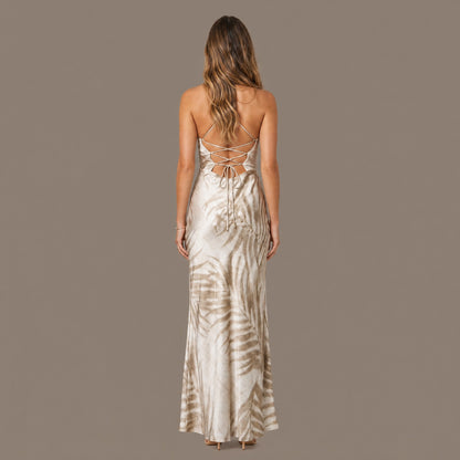 Back view of the tropical satin maxi dress showing the lace up back